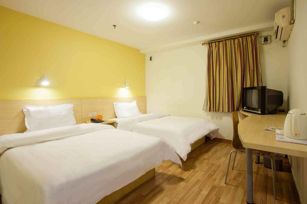 7Days Inn Luoyang Zhongzhou Road Hall Of Enlightened Rule Rum bild
